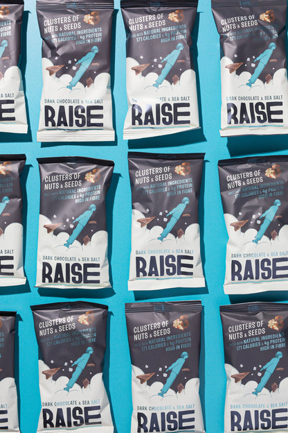 Raise Snacks Dark Chocolate & Sea Salt Clusters of Nuts & Seeds - 35g (Pack of 12)